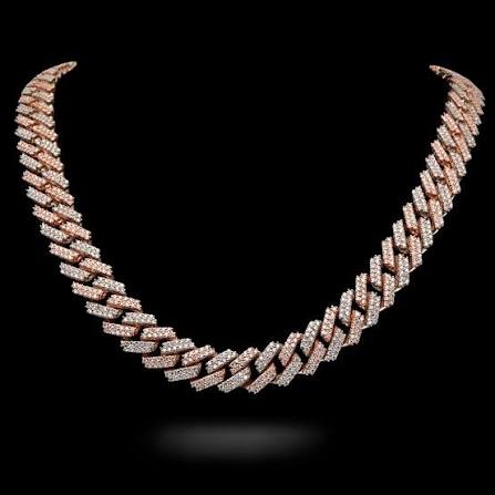 Rose gold and white pavé diamond spiked Cuban link necklace in a U-shape on a black background